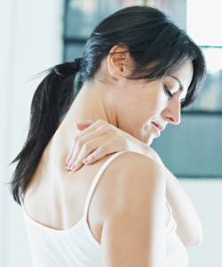 woman massaging neck.